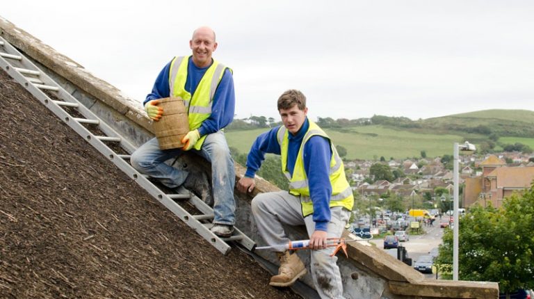 Roll up the barrel! New finial tops brewery roof restoration