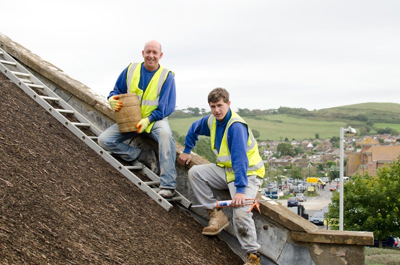Roll up the barrel! New finial tops brewery roof restoration