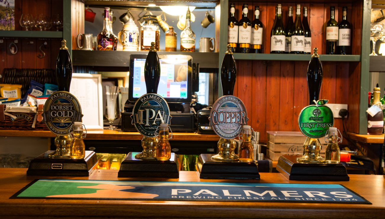 Beer pumps at the Royal George in West Coker, Yeovil