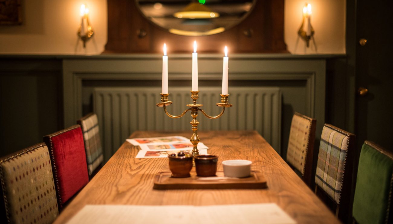 Candles on a table at The Thimble Inn Piddlehinton, Dorset.