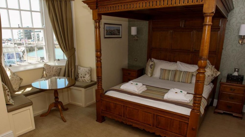 George Hotel West Bay bedroom